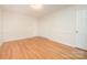 Bedroom with hardwood floors, chair railing and standard closet space at 126 Harbourtown Dr, Kings Mountain, NC 28086