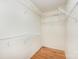 Walk-in closet with shelves and hardwood floors at 126 Harbourtown Dr, Kings Mountain, NC 28086