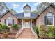 Welcoming front entrance with brick steps, white railings, and a beautiful double door at 126 Harbourtown Dr, Kings Mountain, NC 28086