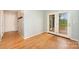 Bright hallway leads to an exit with French doors and hardwood floors at 126 Harbourtown Dr, Kings Mountain, NC 28086