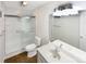 Bathroom with new shower, modern fixtures, and vanity with sink and mirror at 1313 Ridgewood Dr, Concord, NC 28027