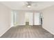 Neutral-toned main bedroom with walk-in closet and multiple entryways for added functionality at 1313 Ridgewood Dr, Concord, NC 28027