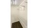 Walk-in closet with shelves and carpet, ready for storage and organization at 1313 Ridgewood Dr, Concord, NC 28027