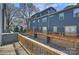 Multi-level deck offers space to grill, relax, and enjoy the backyard view at 1317 Queen Lyon Ct, Charlotte, NC 28205