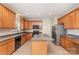 Eat-in kitchen with stainless steel appliances, center island, and modern finishes at 1615 Jekyll Ln, Waxhaw, NC 28173