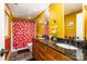 Bright bathroom featuring double sinks, decorative shower curtain, and modern fixtures at 195 Sandalwood Ln, China Grove, NC 28023