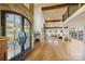 Elegant foyer with high ceilings, hardwood floors, and a grand entrance, creating a welcoming ambiance at 19528 Mary Ardrey Cir, Cornelius, NC 28031