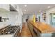 Modern kitchen featuring stainless steel appliances and long island at 19528 Mary Ardrey Cir, Cornelius, NC 28031