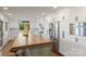 Beautiful kitchen with a large island, white cabinets, and stainless steel appliances at 19528 Mary Ardrey Cir, Cornelius, NC 28031