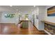 Spacious kitchen featuring a long island, stainless appliances, and views to the backyard at 19528 Mary Ardrey Cir, Cornelius, NC 28031