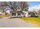 View of house and detached garage showing ample parking space at 1993 Moss Farm Rd, Hickory, NC 28602
