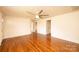 Bright and airy living room featuring hardwood floors and neutral walls for a welcoming atmosphere at 1993 Moss Farm Rd, Hickory, NC 28602