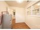 Efficient utility room with wood-look flooring and water heater at 1993 Moss Farm Rd, Hickory, NC 28602