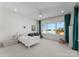 Bright bedroom with a large window offering a great view, a couch, and great natural light at 20637 Island Forest Dr, Cornelius, NC 28031