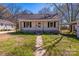 Charming single-story home featuring a cozy front porch and classic design at 208 Columbia Ave, Rock Hill, SC 29730