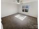 Spacious bedroom featuring neutral colors, a ceiling fan and large windows at 2115 Genesis Dr, Monroe, NC 28110