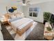 Serene bedroom with a large window, ceiling fan, and a cozy rug at 2115 Genesis Dr, Monroe, NC 28110