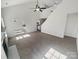 Spacious living room with a fireplace and an open layout towards the kitchen area at 2115 Genesis Dr, Monroe, NC 28110