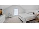 Bedroom featuring a window, bedside table, and neutral carpet at 218 Alenda Lux Cir, Mooresville, NC 28115