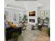 Inviting living room with fireplace, comfortable seating, and natural light at 218 Alenda Lux Cir, Mooresville, NC 28115