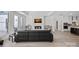 Bright living room featuring a modern fireplace, large windows, and contemporary furnishings at 218 Alenda Lux Cir, Mooresville, NC 28115