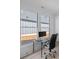 Office with bright windows overlooking backyard, minimalist desk, and modern chair at 218 Alenda Lux Cir, Mooresville, NC 28115