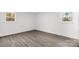 Bright bedroom featuring durable flooring and two windows that provide natural light at 2225 Grace Church Rd, Salisbury, NC 28147