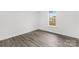 Bright bedroom featuring durable flooring and a window that provides natural light at 2225 Grace Church Rd, Salisbury, NC 28147