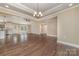 Spacious living area with hardwood floors, recessed lighting and an open floor plan at 24 Eastwinds Dr, Hickory, NC 28601