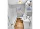 Well-lit bathroom showcases a tub, modern vanity, and neutral palette perfect for relaxation at 279 Timberland Loop, Mooresville, NC 28115