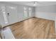 Spacious living room featuring lots of natural light and attractive flooring at 279 Timberland Loop, Mooresville, NC 28115