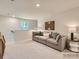 Comfortable loft area featuring plush seating, stylish decor, and natural light at 2946 Legacy Ridge Ln, Catawba, NC 28609