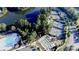 Aerial view of the community amenities, including a pool, tennis courts, and a lake at 3052 Santee Ct, Indian Land, SC 29707