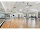 Spacious dance studio featuring hardwood floors, mirrored wall, and plenty of natural light at 3052 Santee Ct, Indian Land, SC 29707