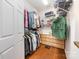 Organized walk-in closet with shelving, drawers, and ample storage space for clothing and accessories at 3052 Santee Ct, Indian Land, SC 29707