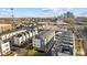 Aerial shot of a modern townhome community with a cityscape view in the background at 3655 Vallette Ct, Charlotte, NC 28203