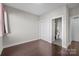 Bedroom with hardwood floors, closet and en-suite bathroom offers comfort and convenience at 3655 Vallette Ct, Charlotte, NC 28203