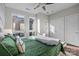 Bedroom with large windows offering natural light, hardwood floors, and a neutral palette at 3655 Vallette Ct, Charlotte, NC 28203