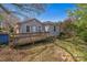 Backyard with wood deck and a detached garage at 405 Link St, Fort Mill, SC 29715