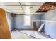 Bedroom showing needed ceiling and flooring repairs, and a window at 405 Link St, Fort Mill, SC 29715