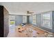 Spacious living room features wood-look floors, and a brick accent wall at 405 Link St, Fort Mill, SC 29715