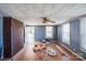 Spacious living room features wood-look floors, and a brick accent wall at 405 Link St, Fort Mill, SC 29715