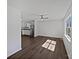 Bright living room with luxury vinyl plank flooring, ceiling fan, and abundant natural light at 426 W Ballard St, Cherryville, NC 28021