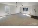 Bright and airy living room with lots of natural light from the windows at 4608 Oakburn Dr, Charlotte, NC 28269