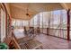 Spacious deck featuring multiple seating areas with views of the lush landscape at 4633 River Bluff Ct, Charlotte, NC 28214