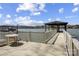 Waterfront property featuring a private boat dock for outdoor seating by the water at 4633 River Bluff Ct, Charlotte, NC 28214