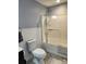 Updated bathroom showcasing a shower-tub combination and sleek toilet at 5434 Beckhaven Ln, Charlotte, NC 28216