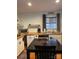 Inviting kitchen with butcher block countertops, floating shelves and a charming dining table at 5434 Beckhaven Ln, Charlotte, NC 28216