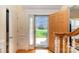 Welcoming foyer features hardwood floors and views of the beautifully landscaped front yard at 6000 Embassy Ct, Wesley Chapel, NC 28110