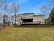 Backyard featuring a multi-tiered deck and lots of green space at 670 Sherwood Pl, Mooresville, NC 28115